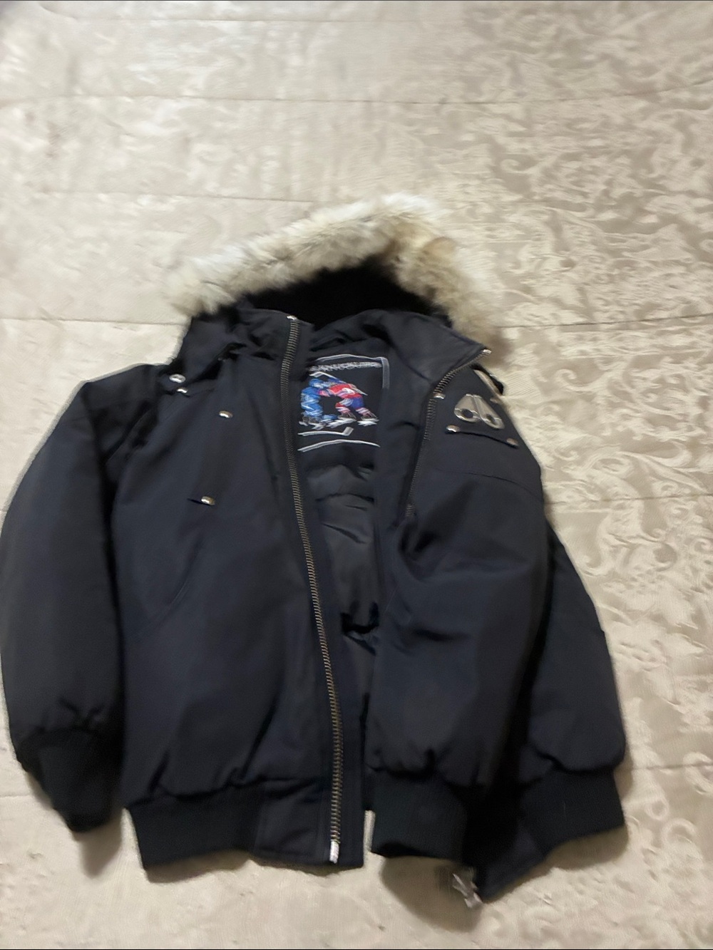 Moose Knuckles Black bomber with real Fur Trim and Embroidered Hockey Patch